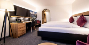 Отель Alpenhotel Schlüssel  Андермат